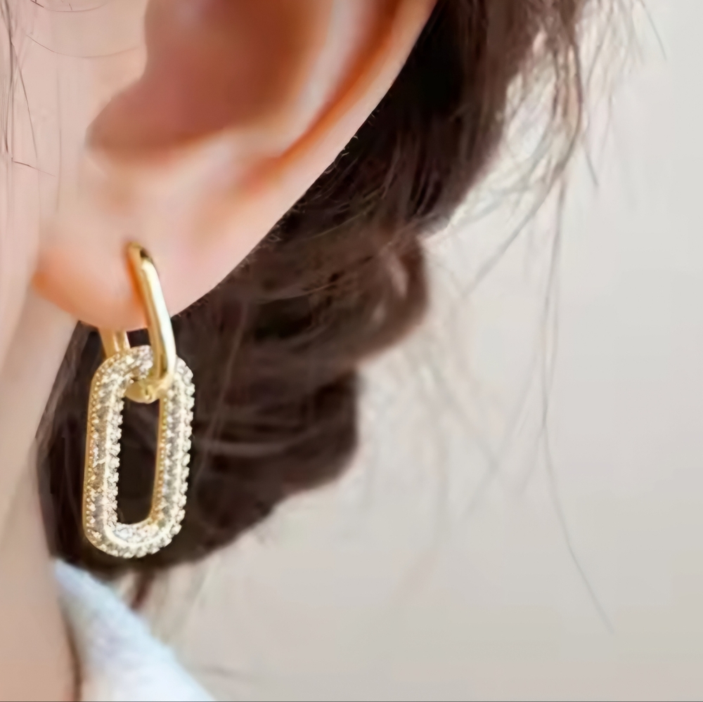 Small hoops with dangle charm